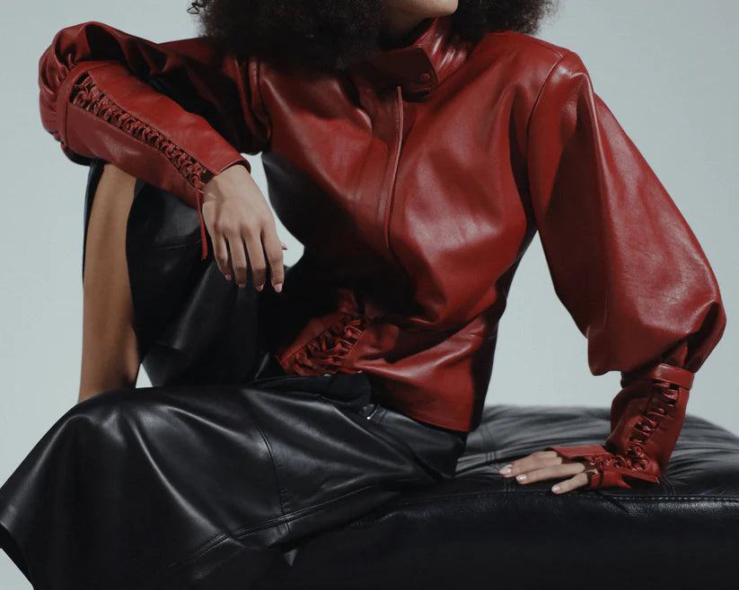 JadeLeatherJacketRedCloseUp.webp