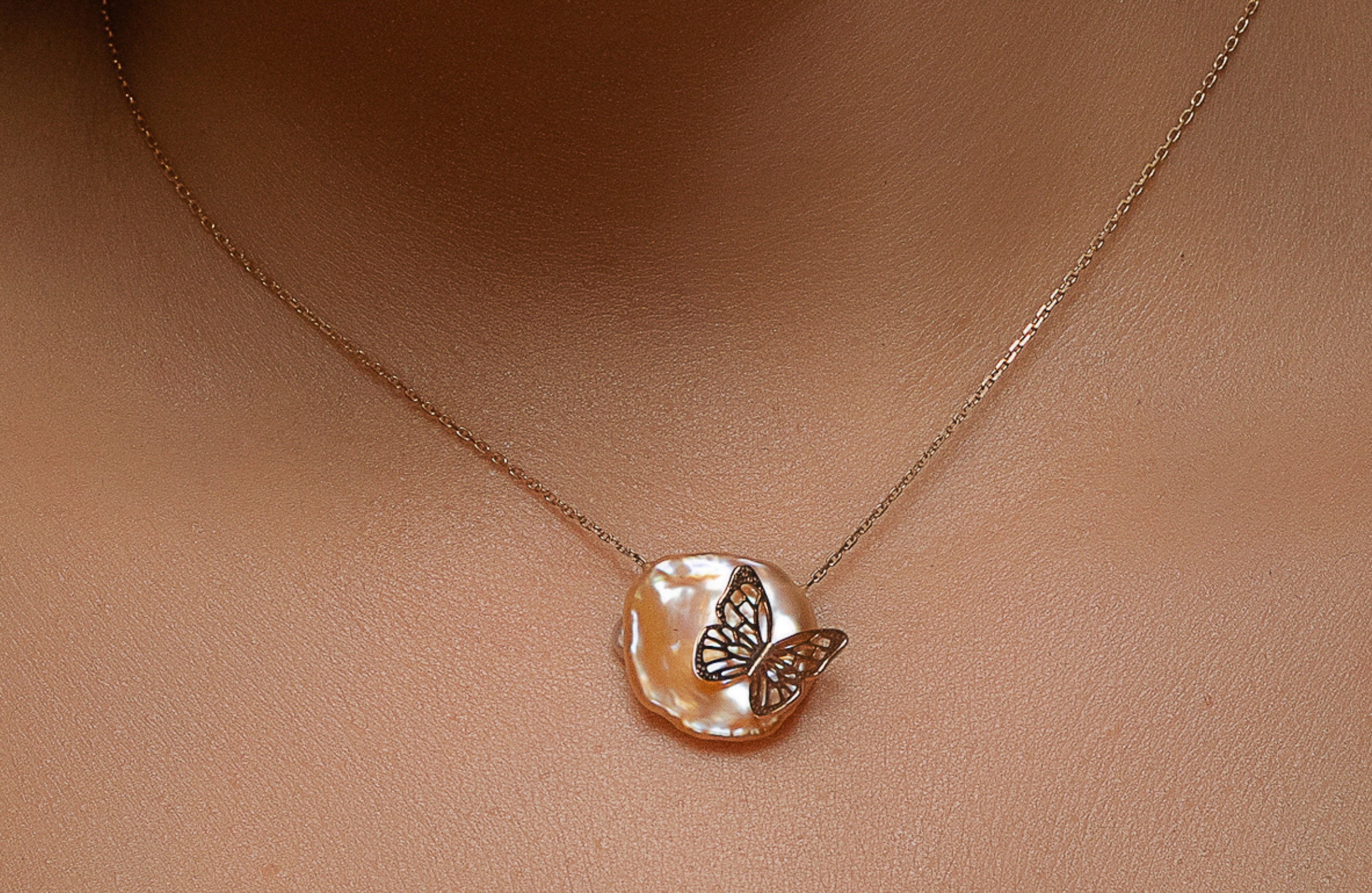 Butterfly on Pearl Necklace: